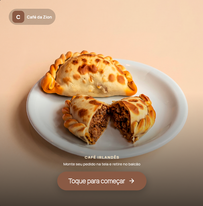 Tela de atração com uma empanada partida ao meio.